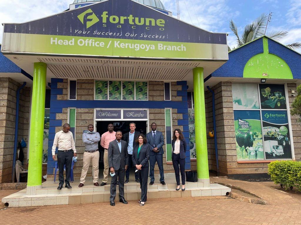 Staff in front of a SACCO in Kenya