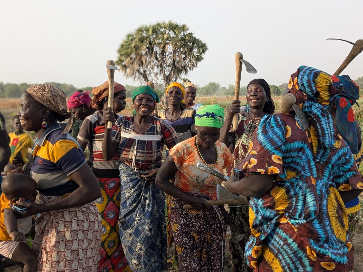 Women producer with their potatoe crops