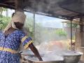 Woman cooking outside